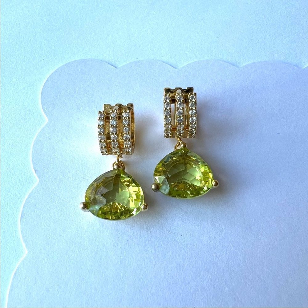 Green Peridot colored crystal earrings on gold huggie hoops. - Picture 2 of 4